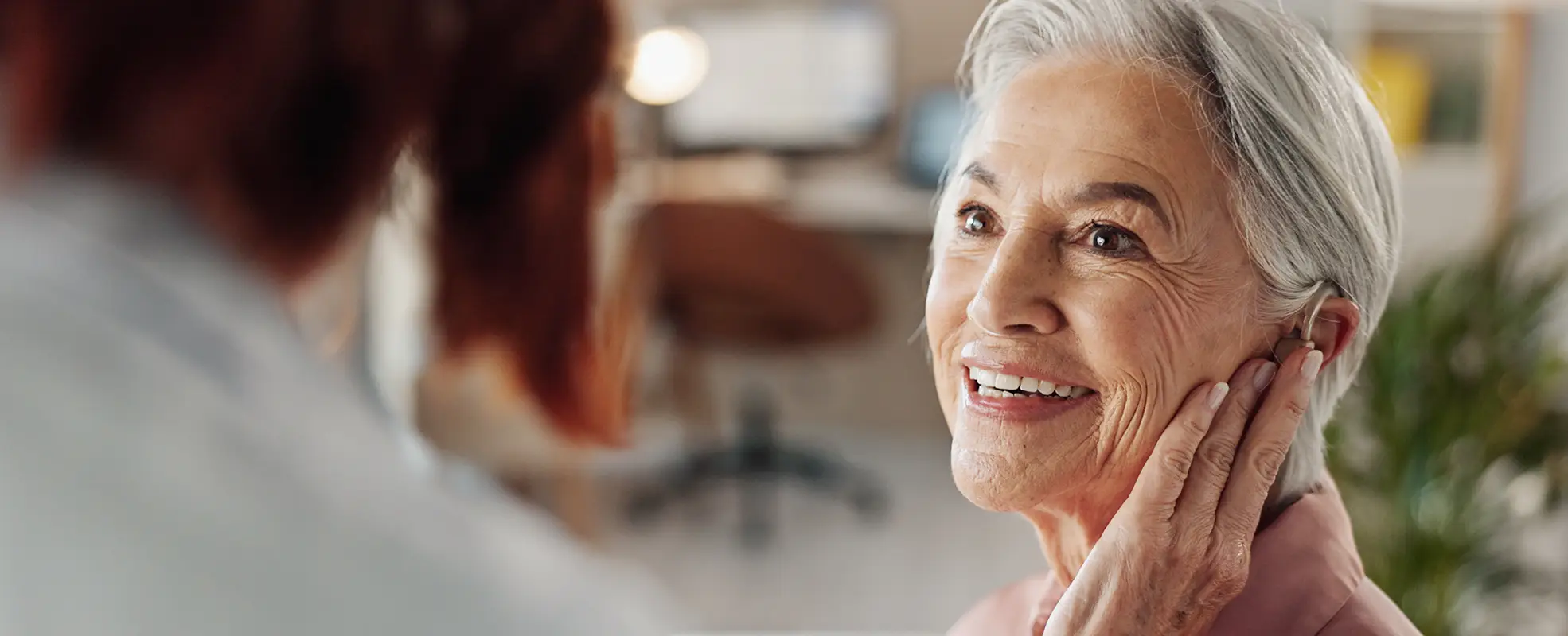 A woman with hearing aid